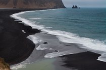 163 The gulf between the volcanic beach of Reynisfjara and  Dyrhólaey Cape