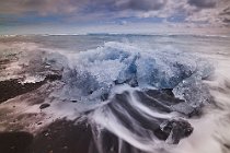 167 Ice block in the beach in front of the glacial lagoon of Jökulsárlón