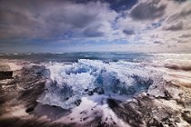 168 Ice block in the beach in front of the glacial lagoon of Jökulsárlón